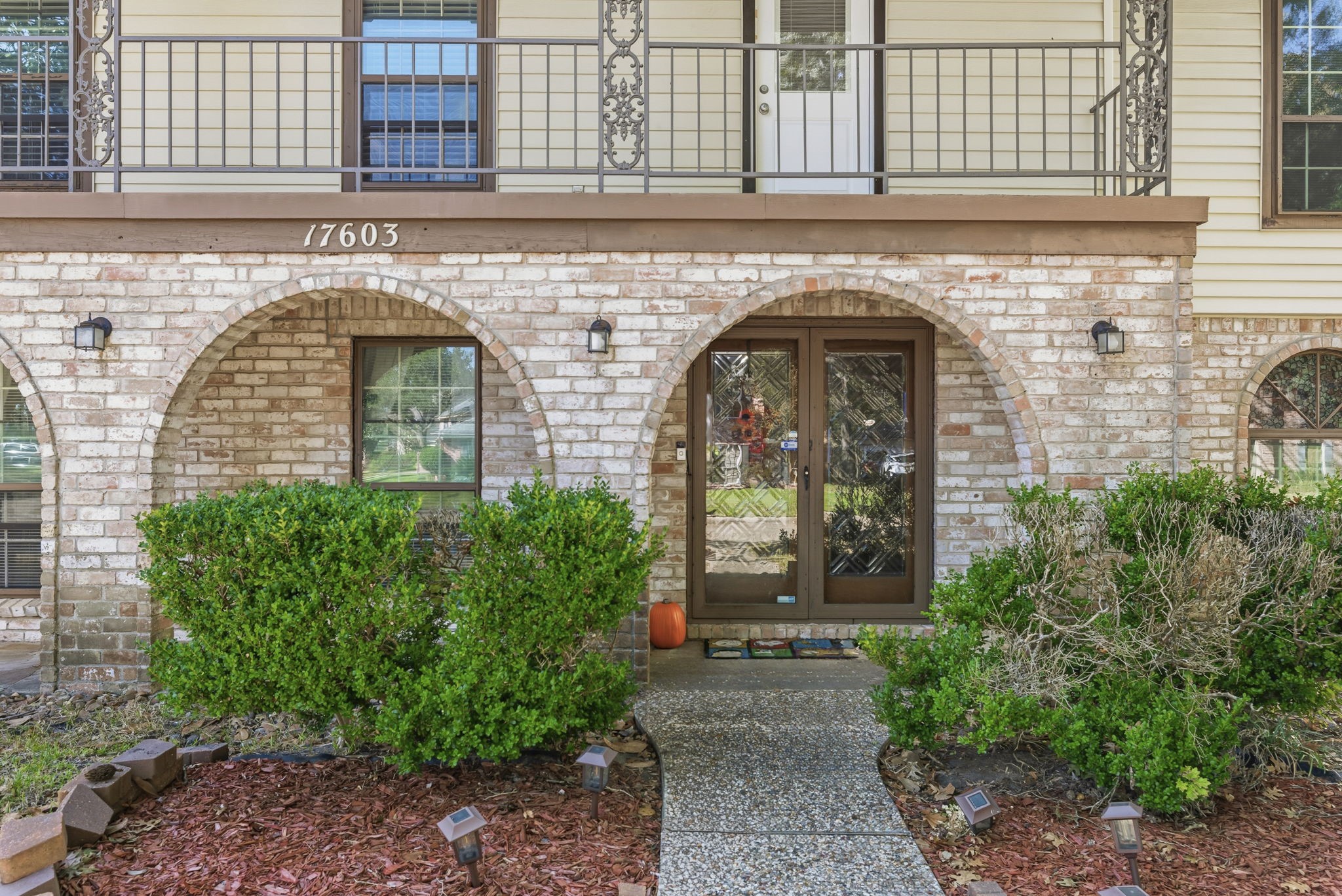 17603 Loring Lane Spring, TX 77388 - Photo 5 of 50 a front view of a building with garden