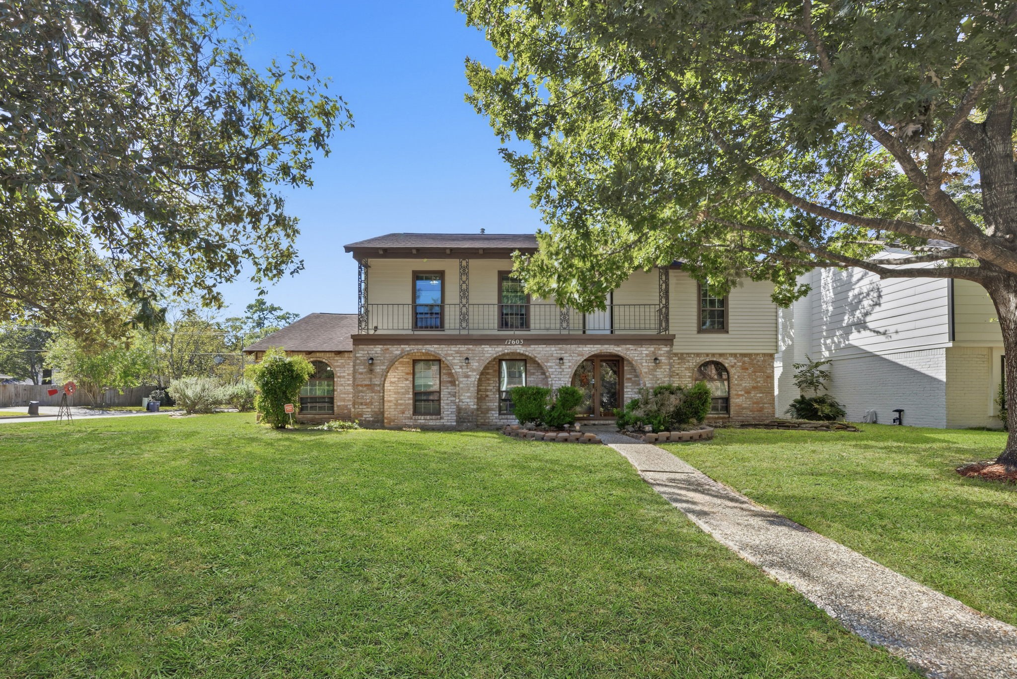 17603 Loring Lane Spring, TX 77388 - Photo 6 of 50 a front view of a house with a yard