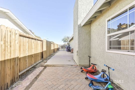 1113 Amie Court Ridgecrest, CA 93555 - Photo 33 of 33 a backyard of a house with outdoor seating