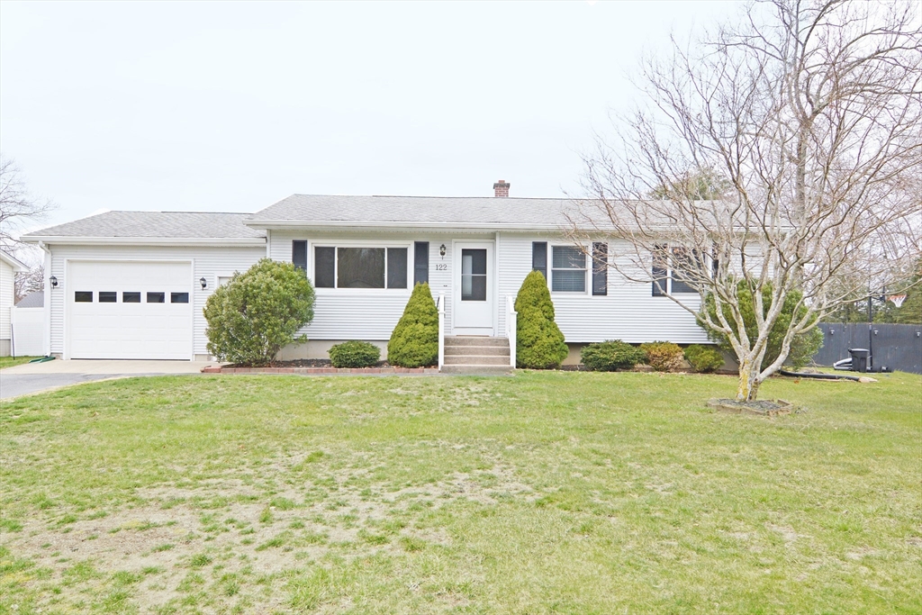 122 Garnet Street Springfield, MA 01129 - Photo 1 of 36 a front view of house with yard and trees