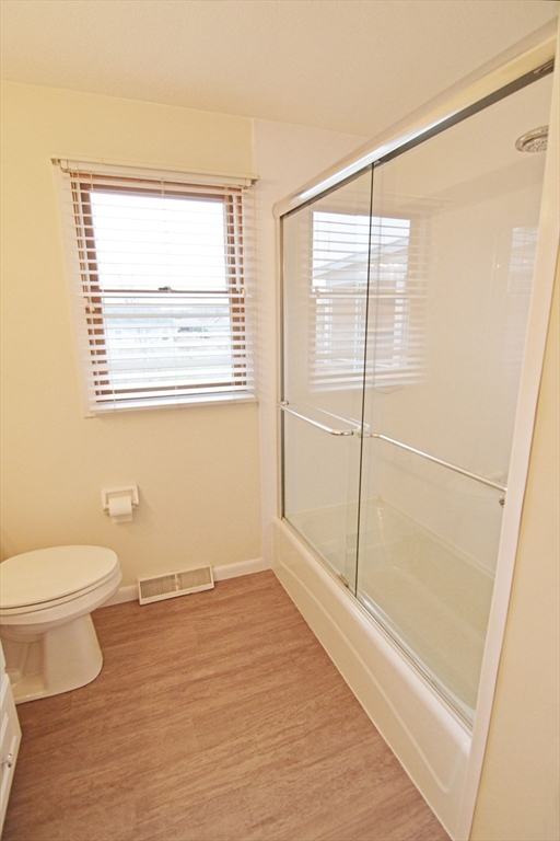 122 Garnet Street Springfield, MA 01129 - Photo 17 of 36 a bathroom with a toilet and a shower
