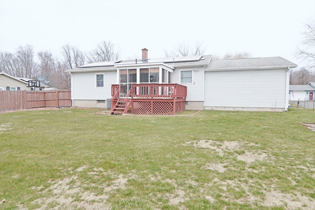 122 Garnet Street Springfield, MA 01129 - Photo 33 of 36 a view of a house with a yard and sitting area