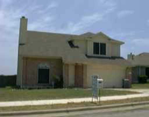 2311 Patsy Parkway Austin, TX 78744 - Photo 1 of 1 a front view of a house with a yard
