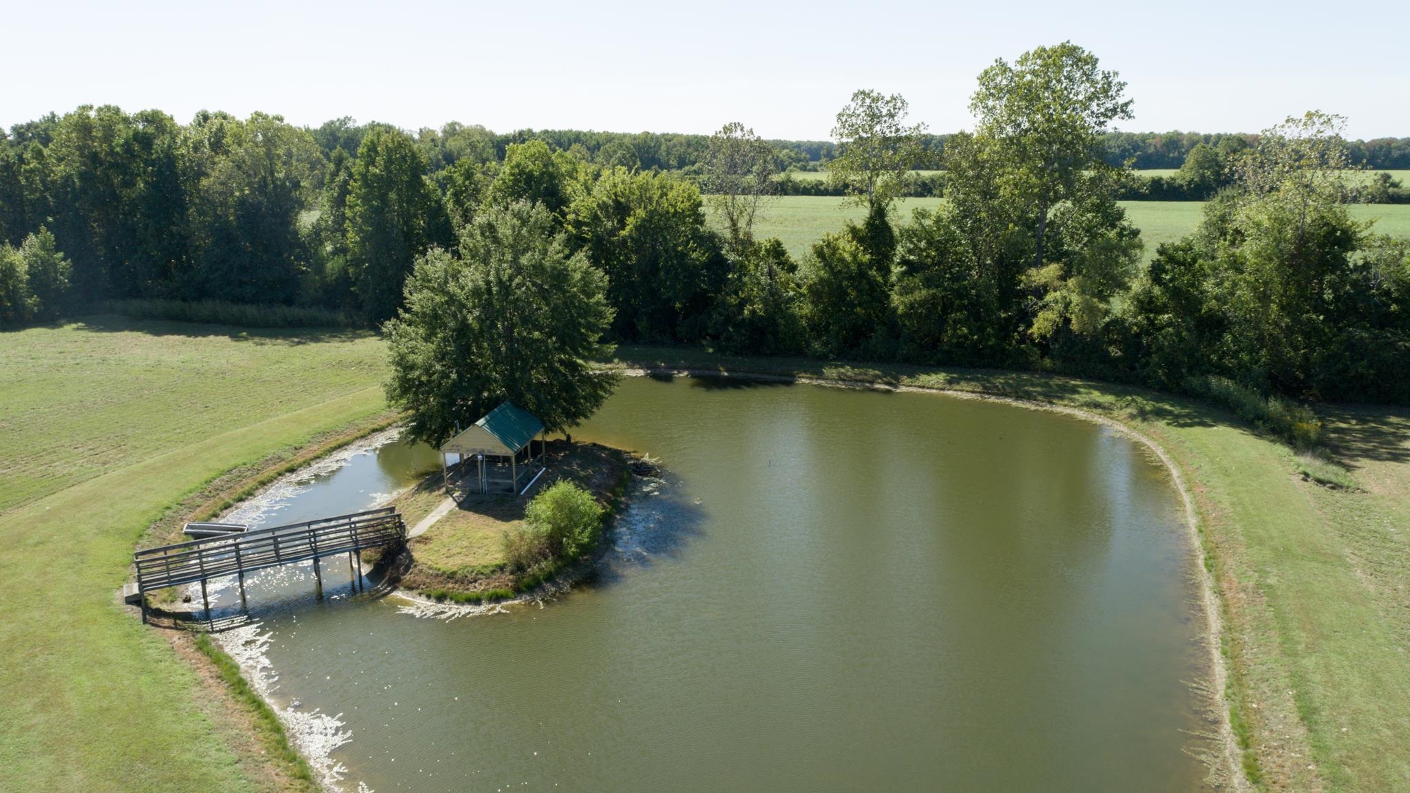 8629 Brunswick Road Millington, TN 38053 - Photo 23 of 25 a view of a lake with a mountain view