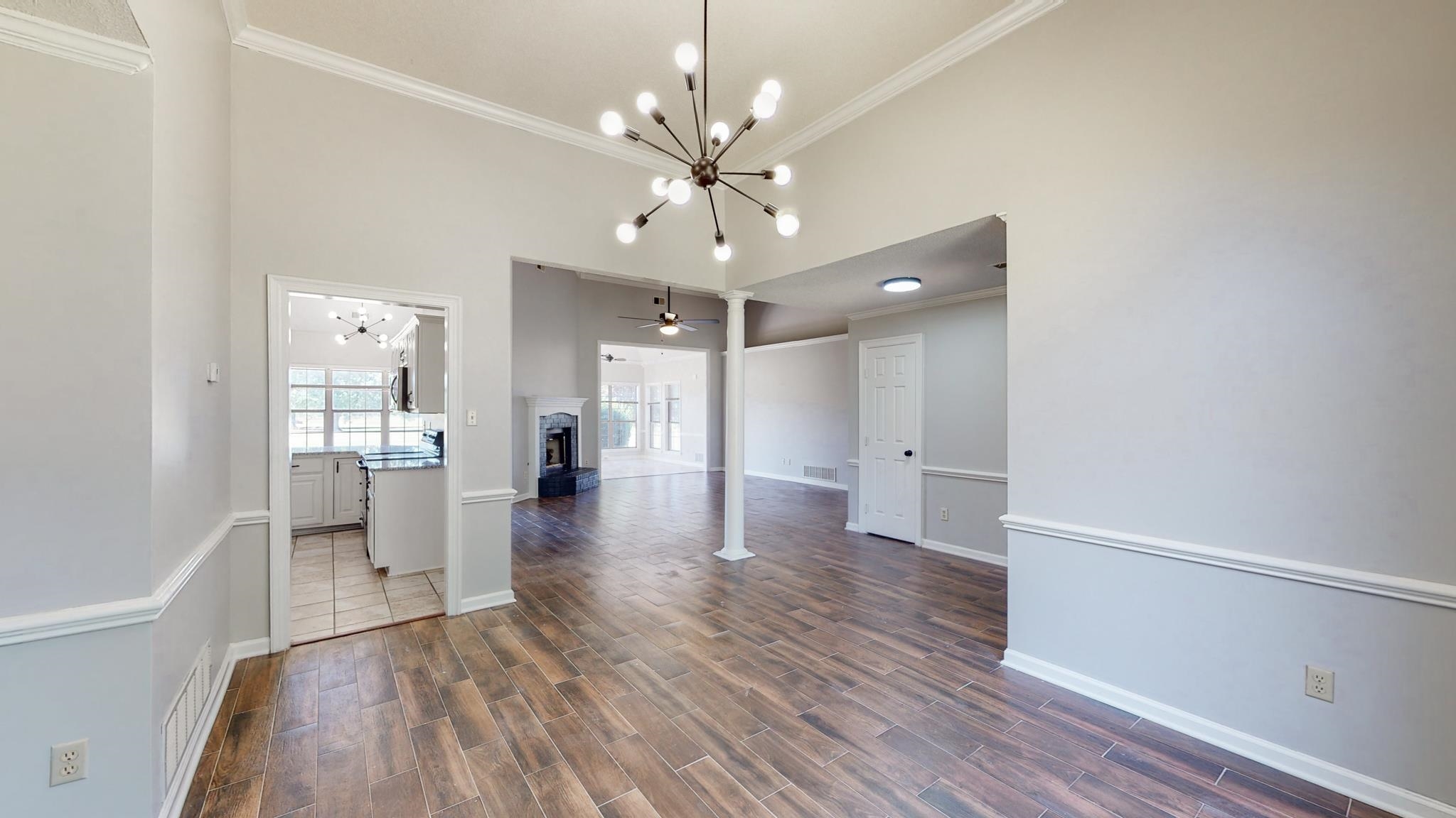 8629 Brunswick Road Millington, TN 38053 - Photo 6 of 25 a view of a livingroom with wooden floor