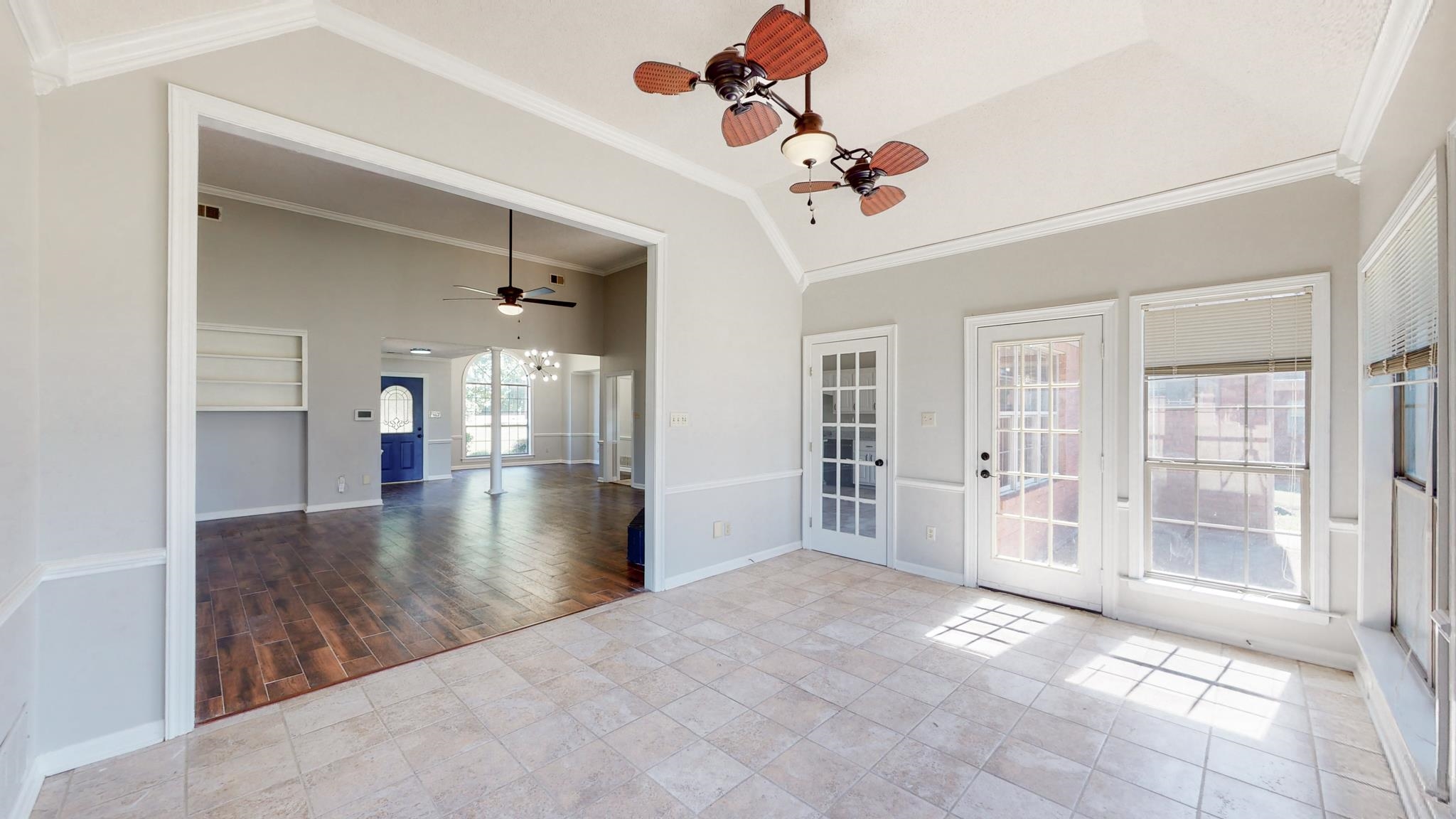 8629 Brunswick Road Millington, TN 38053 - Photo 7 of 25 a view of a livingroom with a ceiling fan window and hardwood floor
