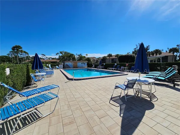 a view of outdoor space swimming pool and outdoor seating