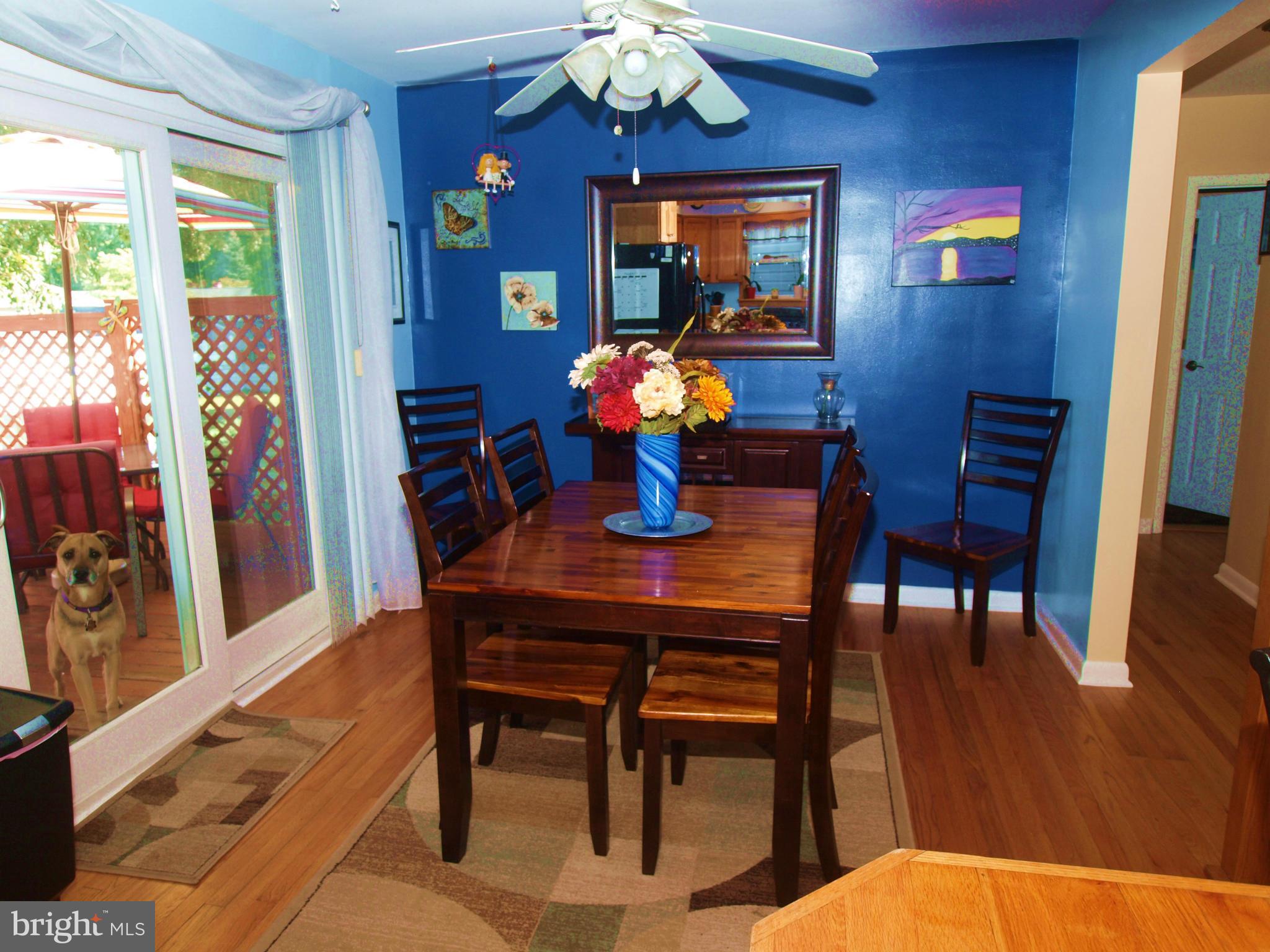 222 Lake Road Pasadena, MD 21122 - Photo 7 of 30 Dining Room Hardwood Floors - Deck Walk-out