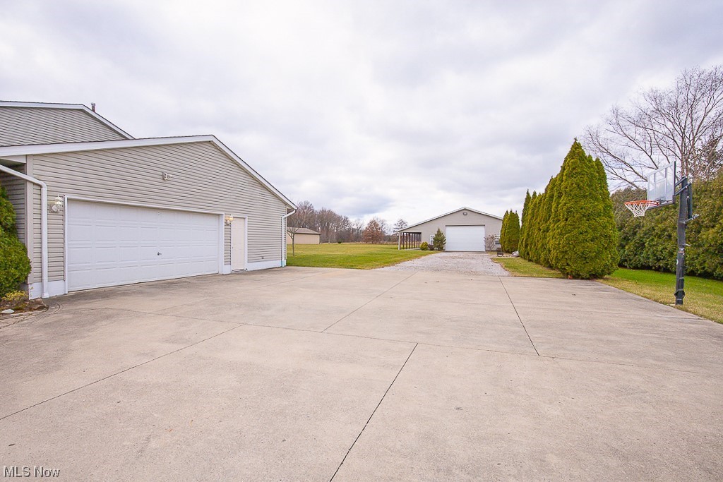 9708 Reed Road Grafton, OH 44044 - Photo 3 of 35 Two plus Car Garage attached and Outbuilding