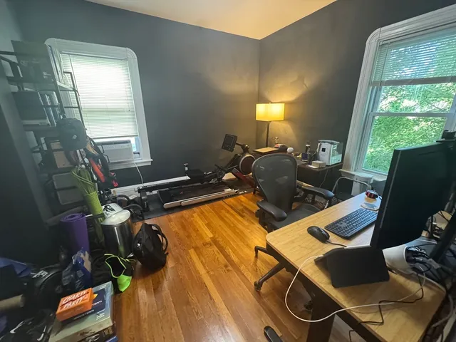 a room with furniture and a window