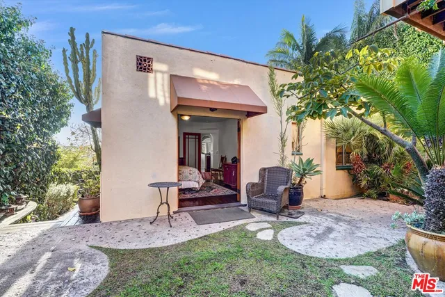 a view of a chairs and tables in the patio