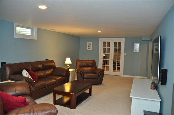 331 Goldthwaite Road Northbridge, MA 01588 - Photo 18 of 23 a living room with furniture and a flat screen tv