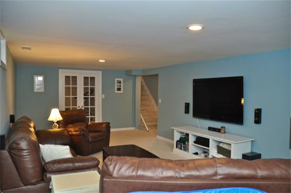 331 Goldthwaite Road Northbridge, MA 01588 - Photo 19 of 23 a living room with furniture and a flat screen tv