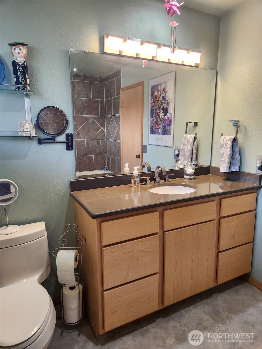 310 West 9th Avenue Ritzville, WA 99169 - Photo 18 of 38 a bathroom with a toilet sink and mirror