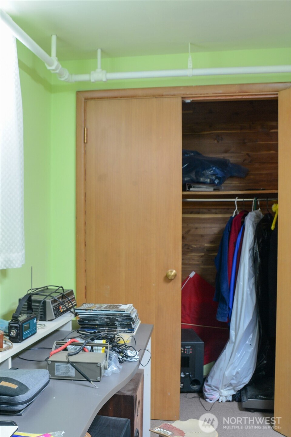 310 West 9th Avenue Ritzville, WA 99169 - Photo 31 of 38 a view of walk in closet with clothes and shoes