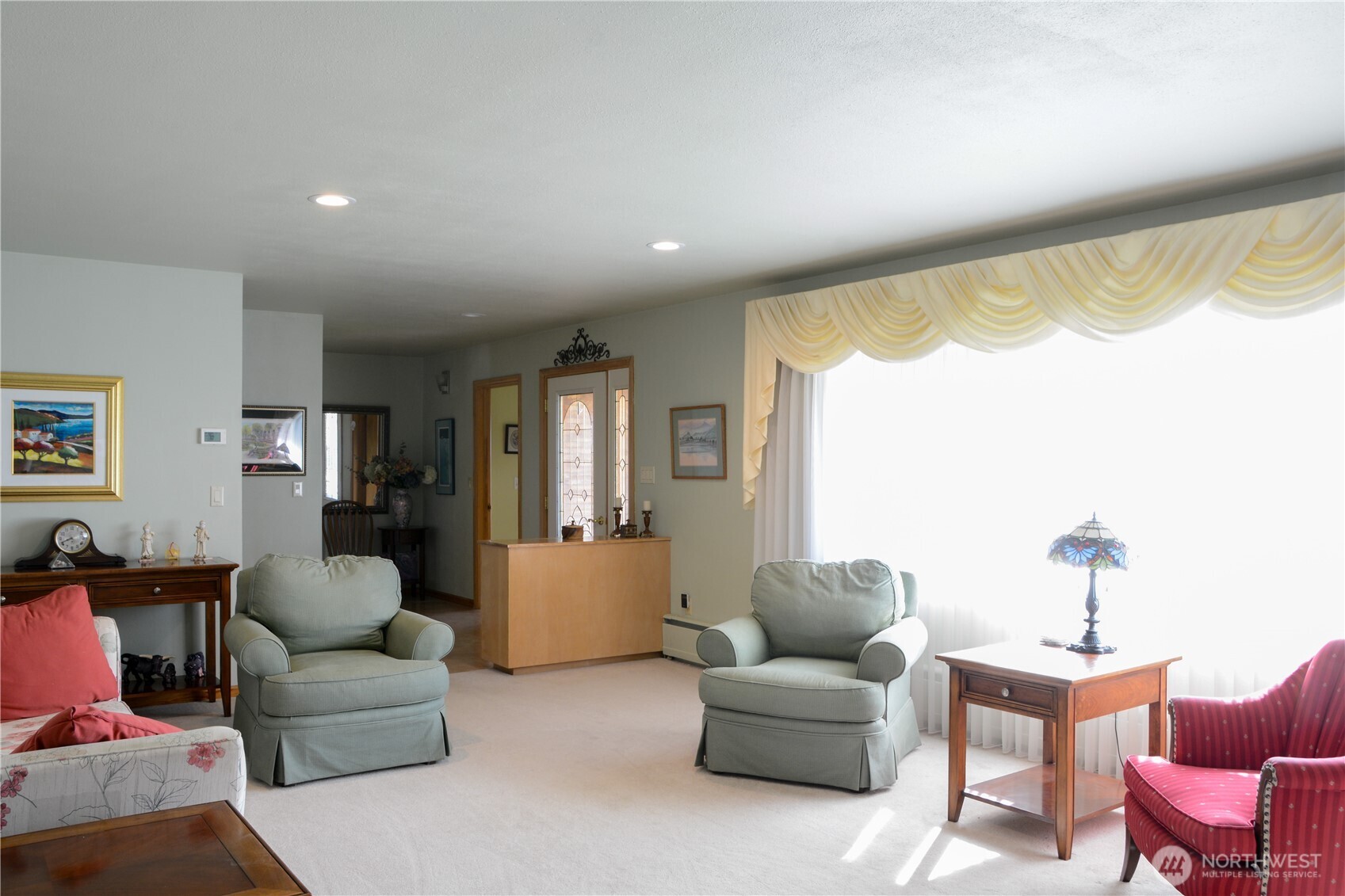 310 West 9th Avenue Ritzville, WA 99169 - Photo 4 of 38 a living room with furniture and a large window