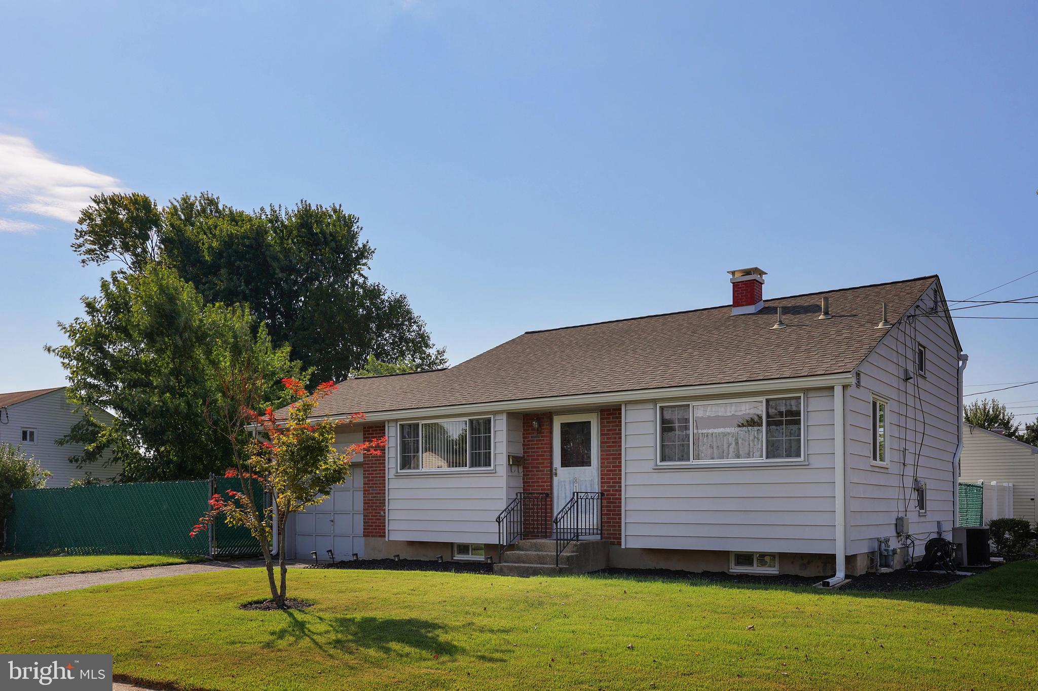 81 Falmouth Road Hamilton, NJ 08620 - Photo 1 of 26 a front view of a house with a garden