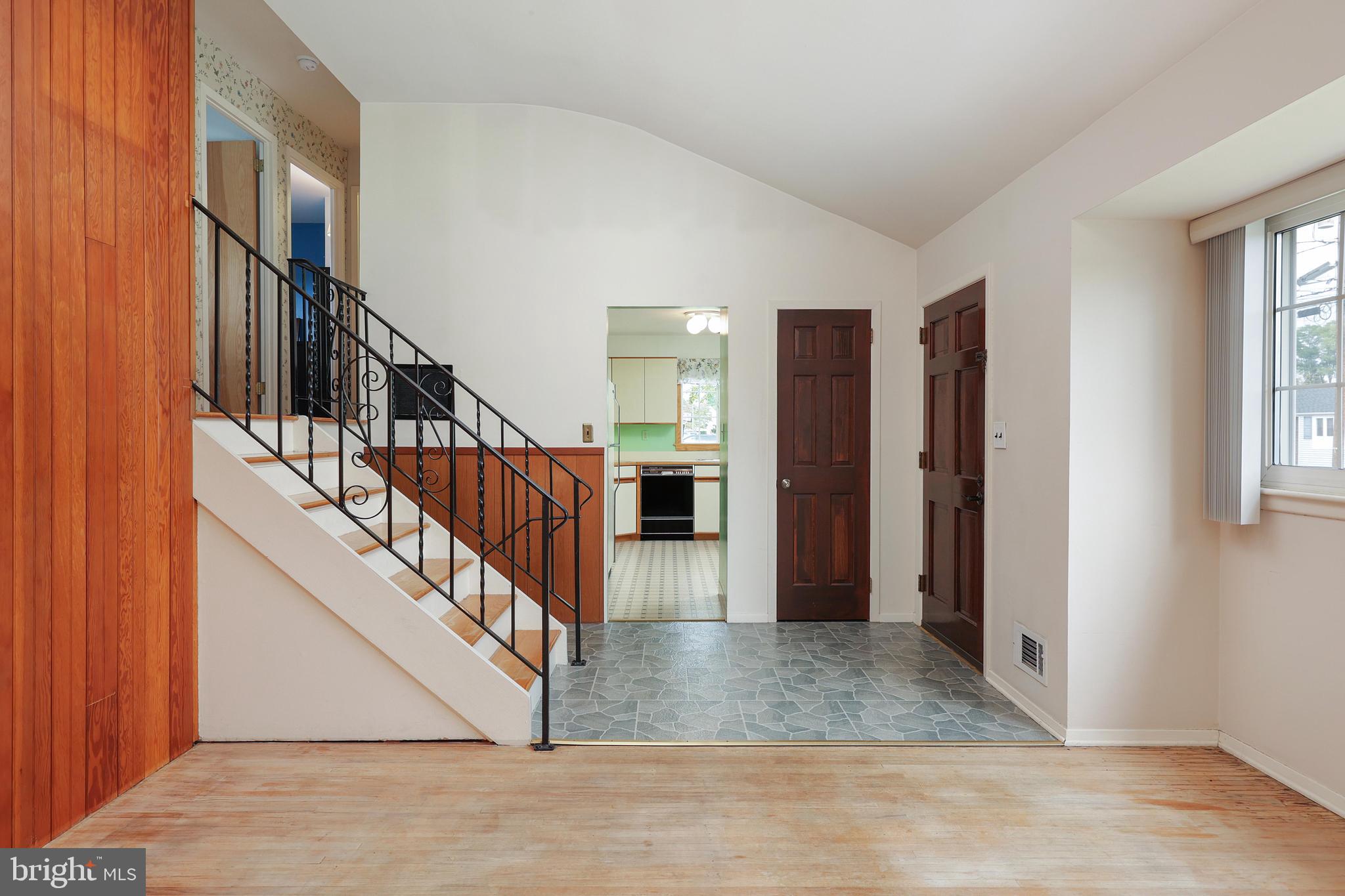 81 Falmouth Road Hamilton, NJ 08620 - Photo 8 of 26 a view of entryway and hall with wooden floor