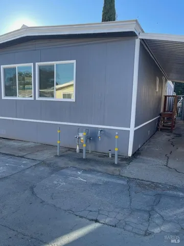 a kitchen with a refrigerator stove and sink