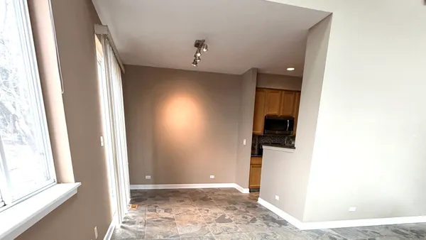 a bathroom with a mirror and a shower