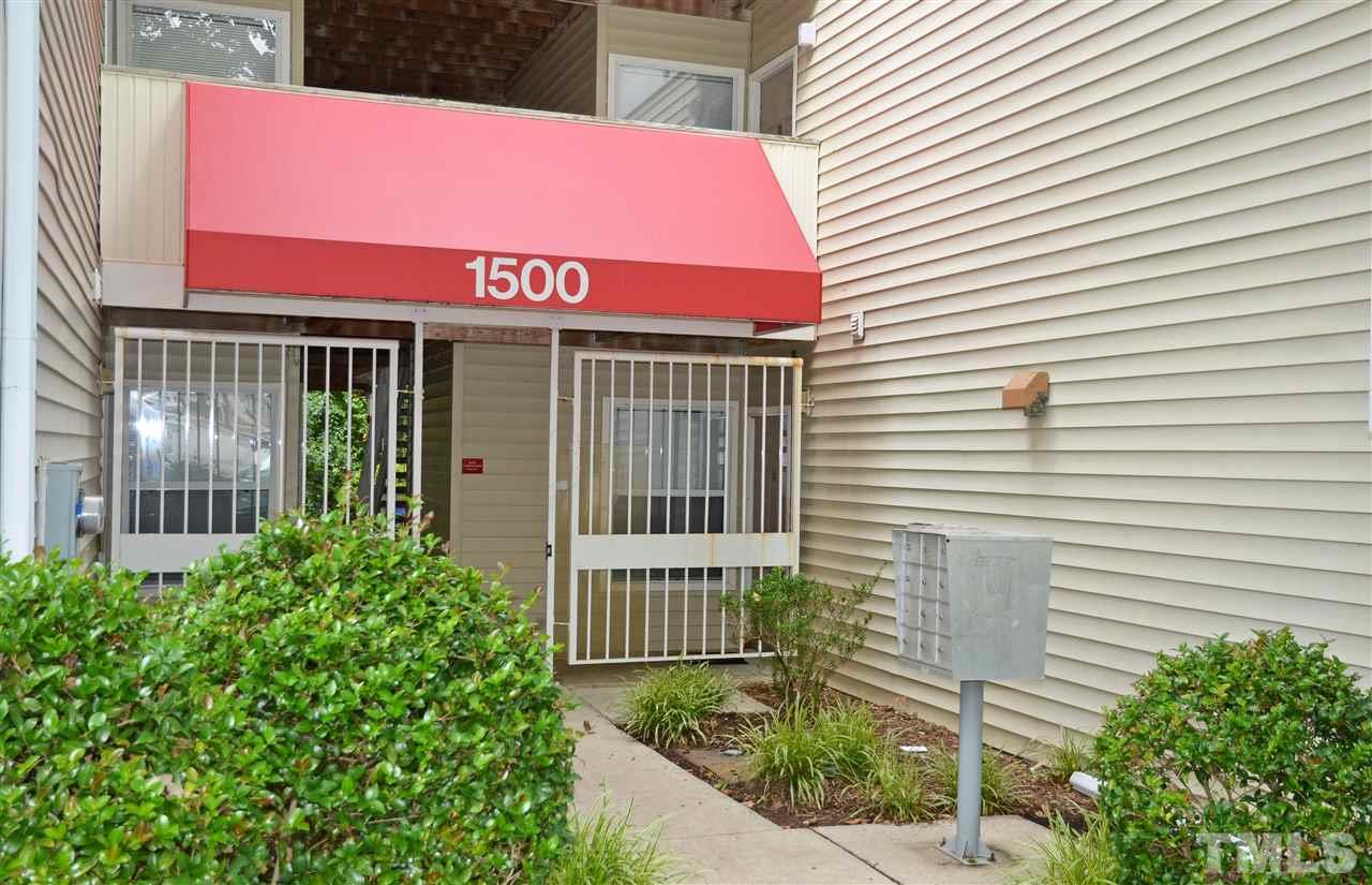 1500 Graduate Lane, Unit 204 Raleigh, NC 27606 - Photo 1 of 23 a view of a house with a small yard and plants