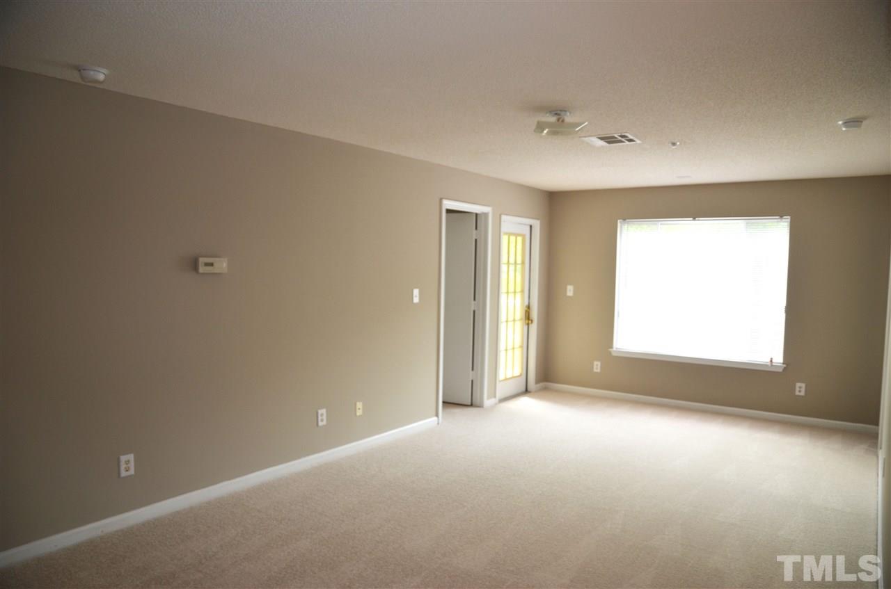 1500 Graduate Lane, Unit 204 Raleigh, NC 27606 - Photo 11 of 23 a view of an empty room with a window