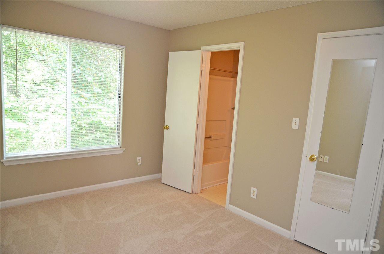 1500 Graduate Lane, Unit 204 Raleigh, NC 27606 - Photo 17 of 23 a view of an empty room with window and closet area
