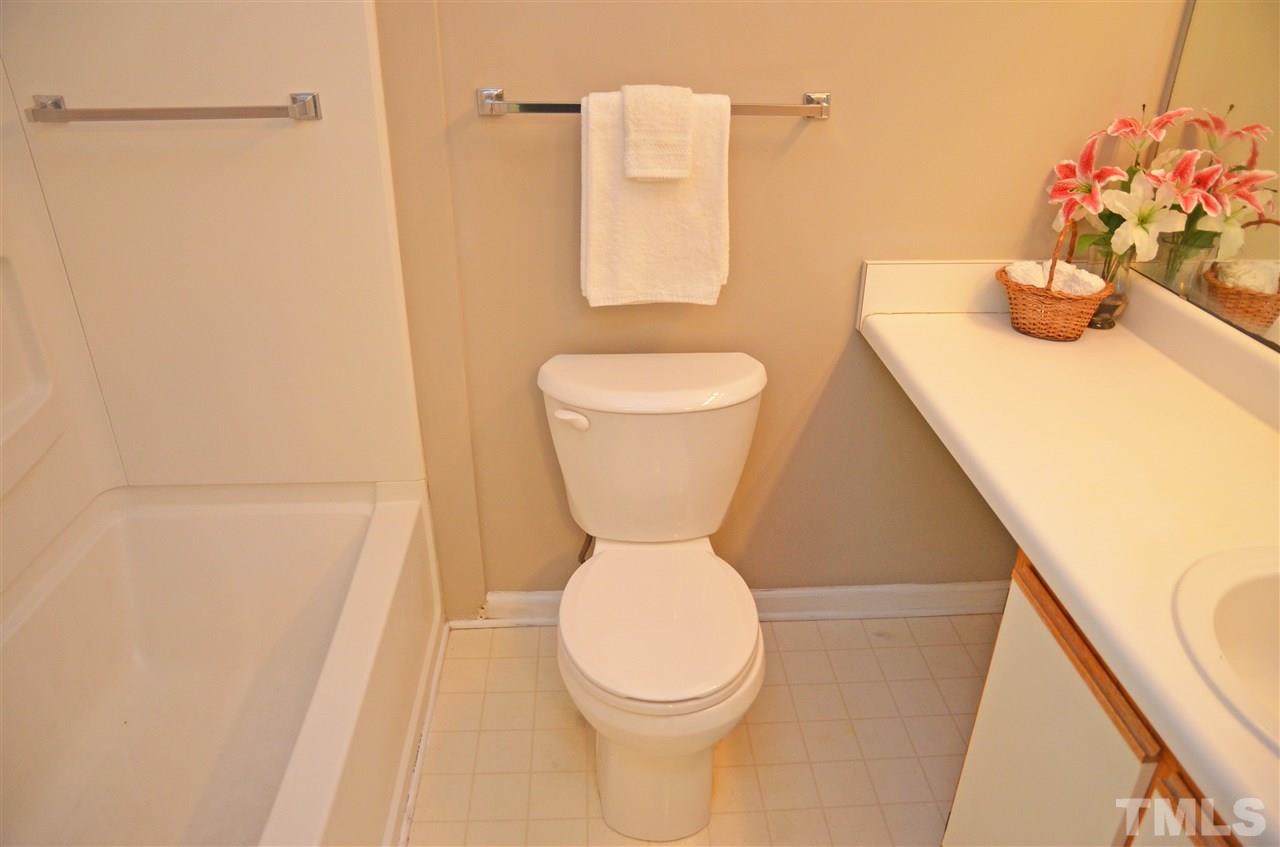 1500 Graduate Lane, Unit 204 Raleigh, NC 27606 - Photo 18 of 23 a bathroom with a sink and a toilet