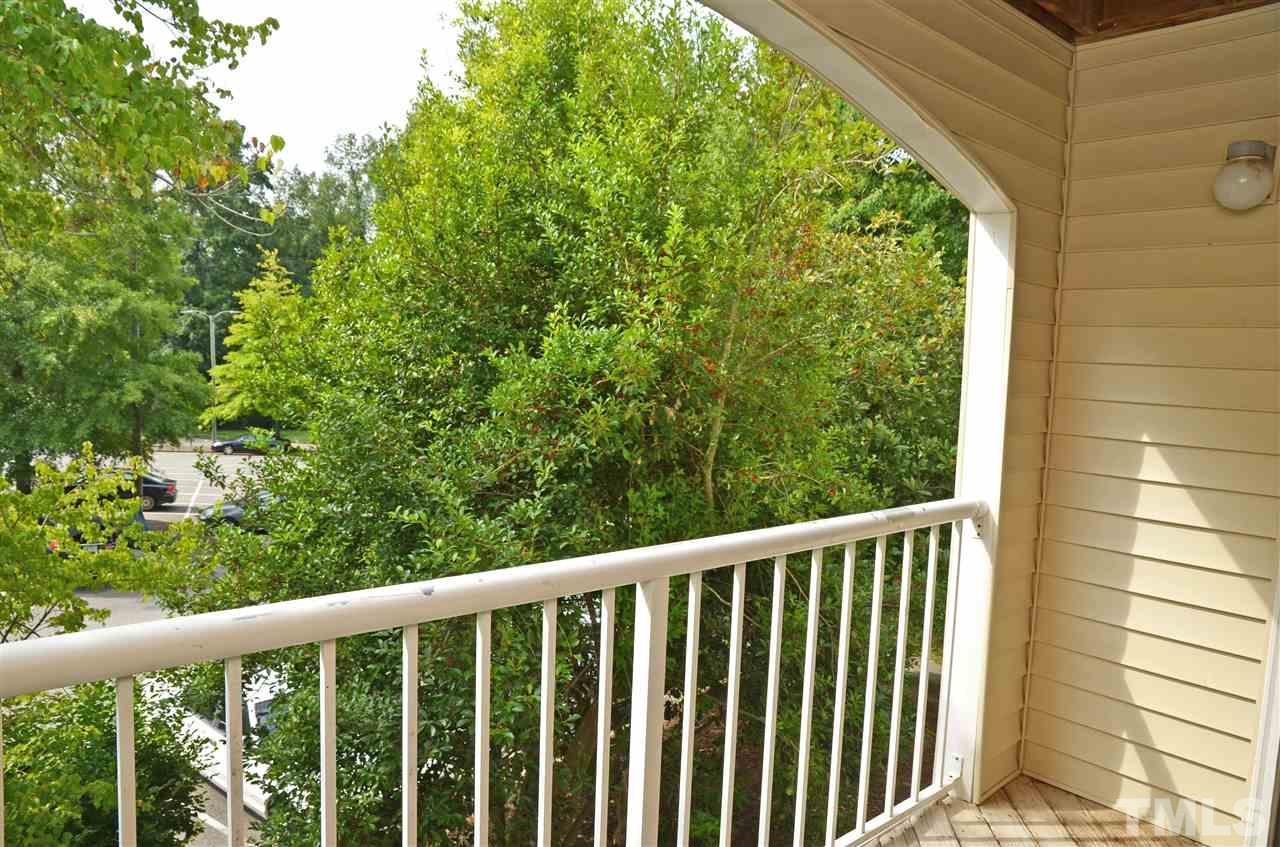 1500 Graduate Lane, Unit 204 Raleigh, NC 27606 - Photo 23 of 23 a view of a balcony with an outdoor space