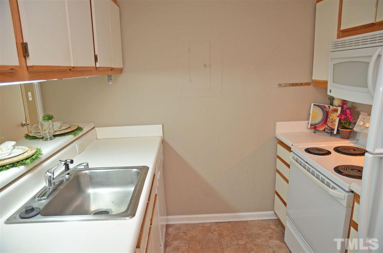 1500 Graduate Lane, Unit 204 Raleigh, NC 27606 - Photo 6 of 23 a utility room with a sink and washing machine