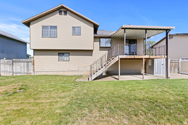 5643 South 2950th Street West Roy, UT 84067 - Photo 11 of 12 Nice large fenced backyard