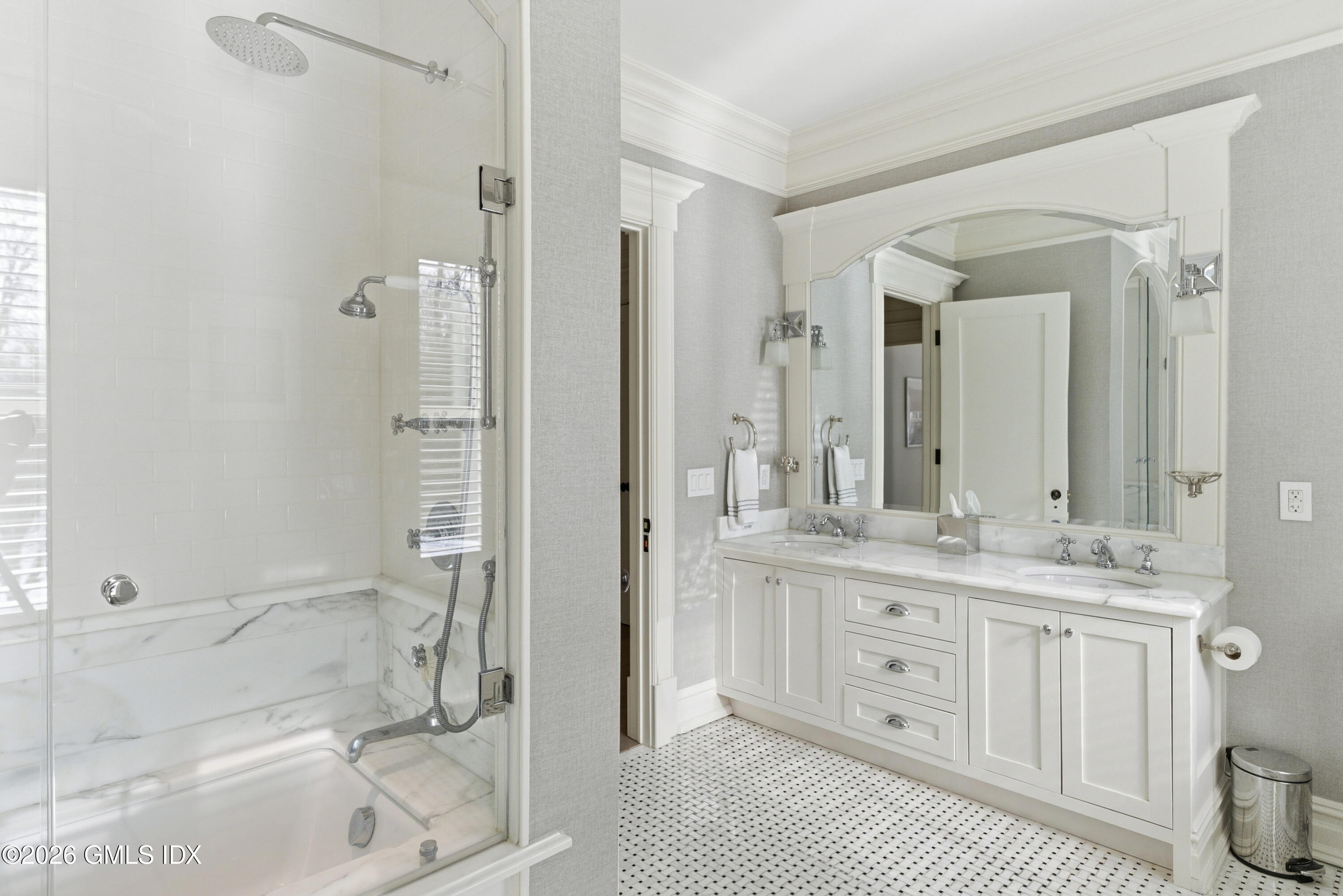 212 Bedford Road Greenwich, CT 06831 - Photo 26 of 39 a bathroom with a double vanity sink a mirror and a bathtub