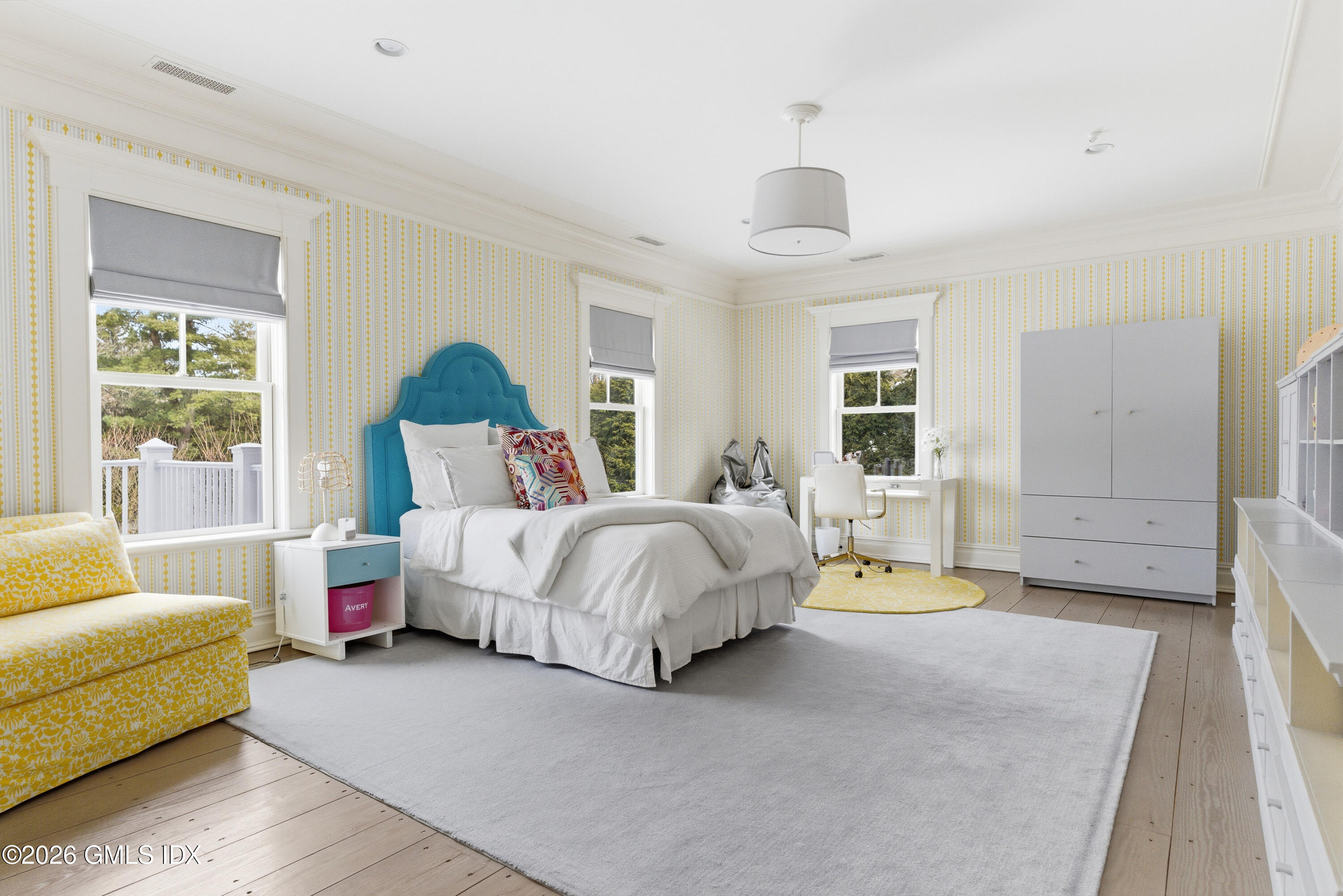212 Bedford Road Greenwich, CT 06831 - Photo 27 of 39 a spacious bedroom with a bed and a couch