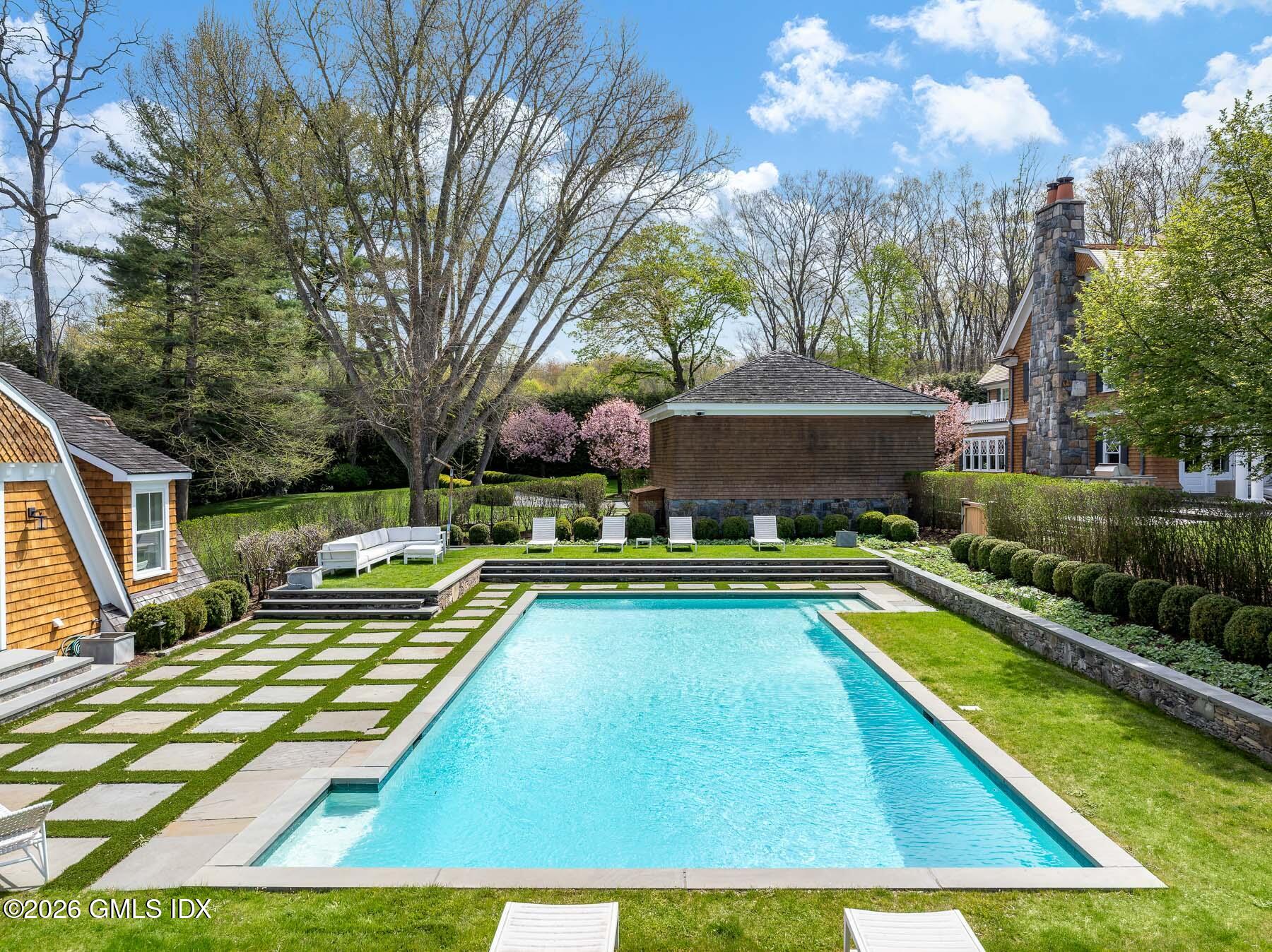212 Bedford Road Greenwich, CT 06831 - Photo 37 of 39 a view of swimming pool with chairs