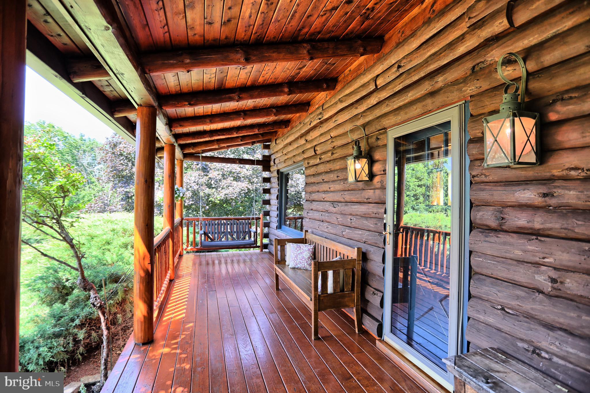 454 Rutter Road Halifax, PA 17032 - Photo 7 of 70 Enjoy coffee and amazing views from 40' porch!