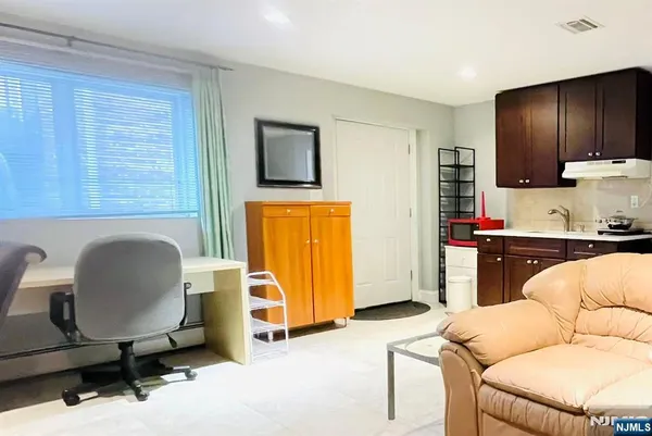 a living room with furniture and a area