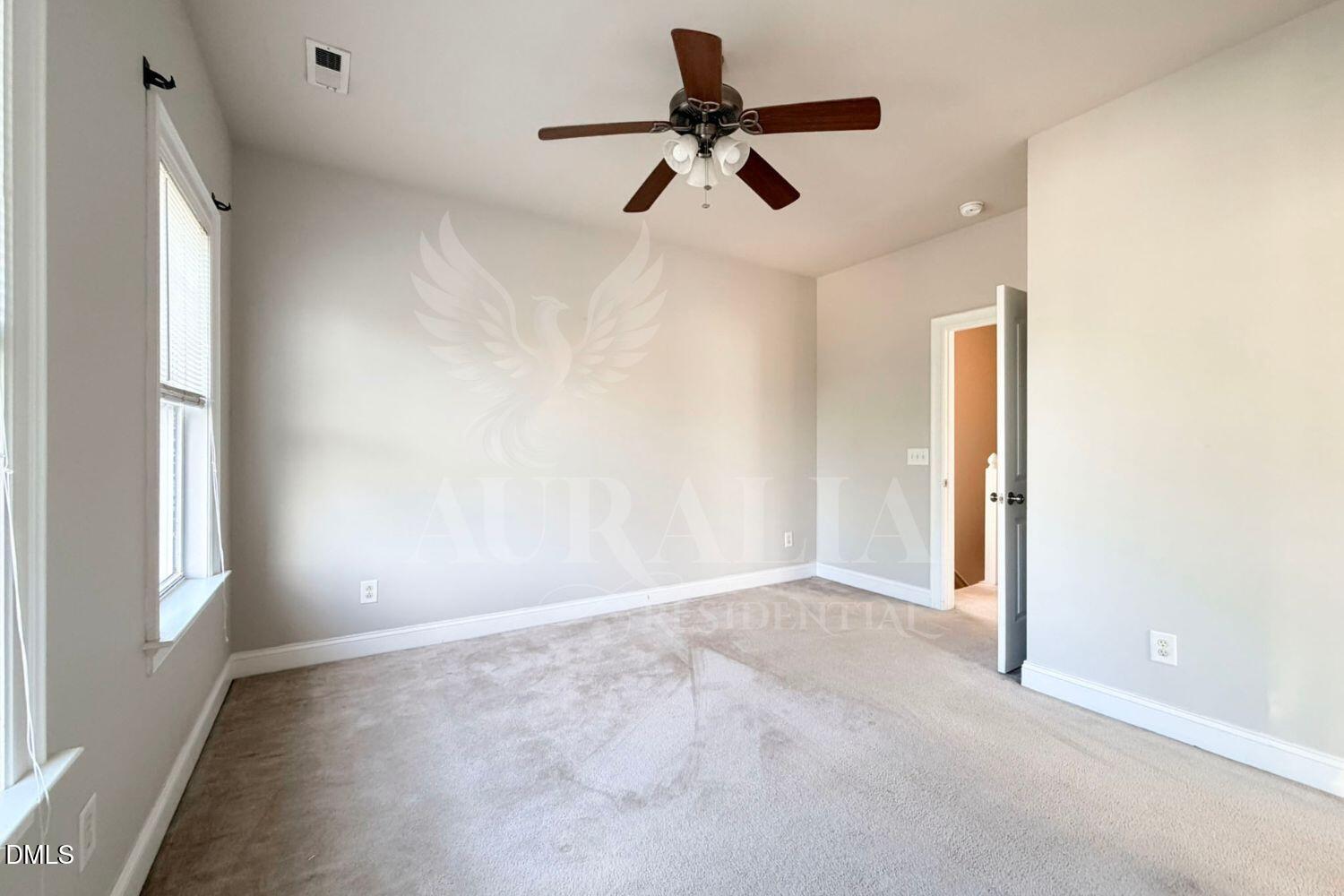 7754 ACC Boulevard Raleigh, NC 27617 - Photo 25 of 41 a view of empty room with ceiling fan