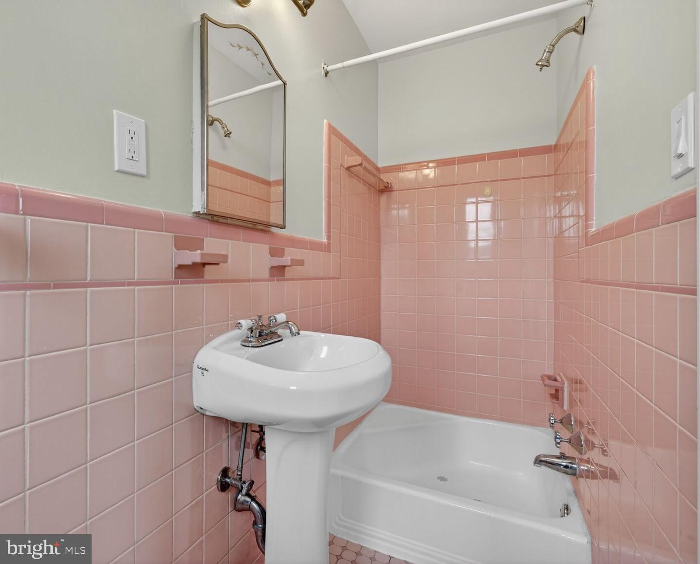 4503 Woodfield Road Kensington, MD 20895 - Photo 11 of 30 Charming vintage bathroom with pink tiles.