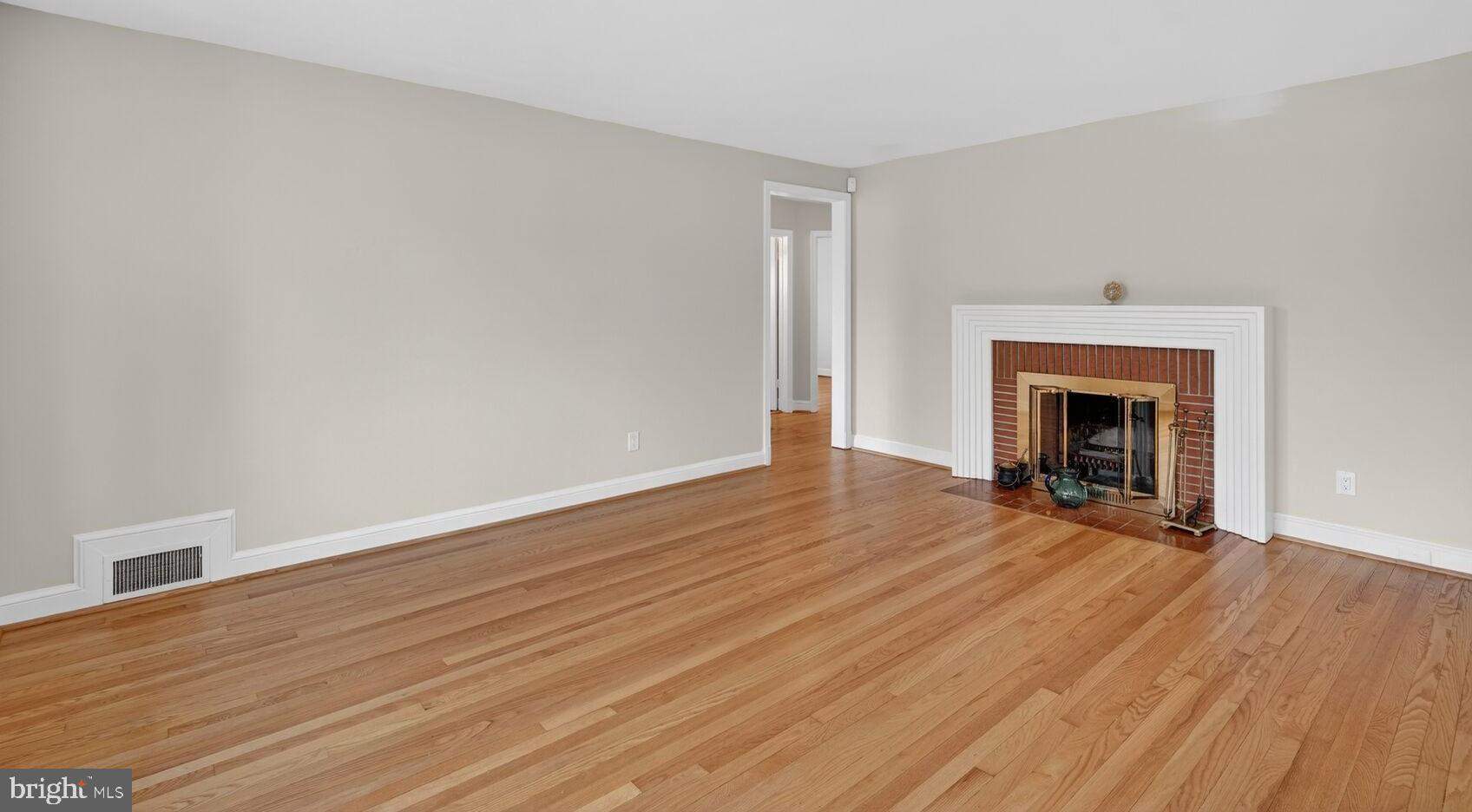 4503 Woodfield Road Kensington, MD 20895 - Photo 14 of 30 Spacious room with elegant hardwood floors.
