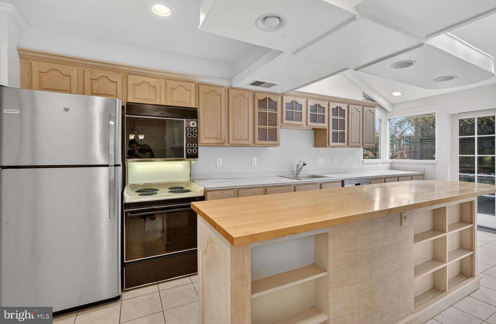 4503 Woodfield Road Kensington, MD 20895 - Photo 16 of 30 Bright and inviting kitchen with modern finishes.