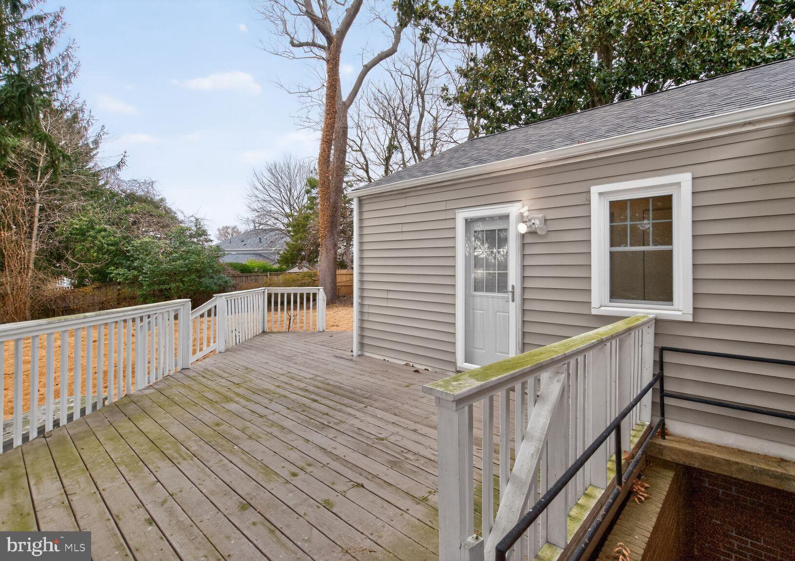 4503 Woodfield Road Kensington, MD 20895 - Photo 21 of 30 Charming deck with serene outdoor views.