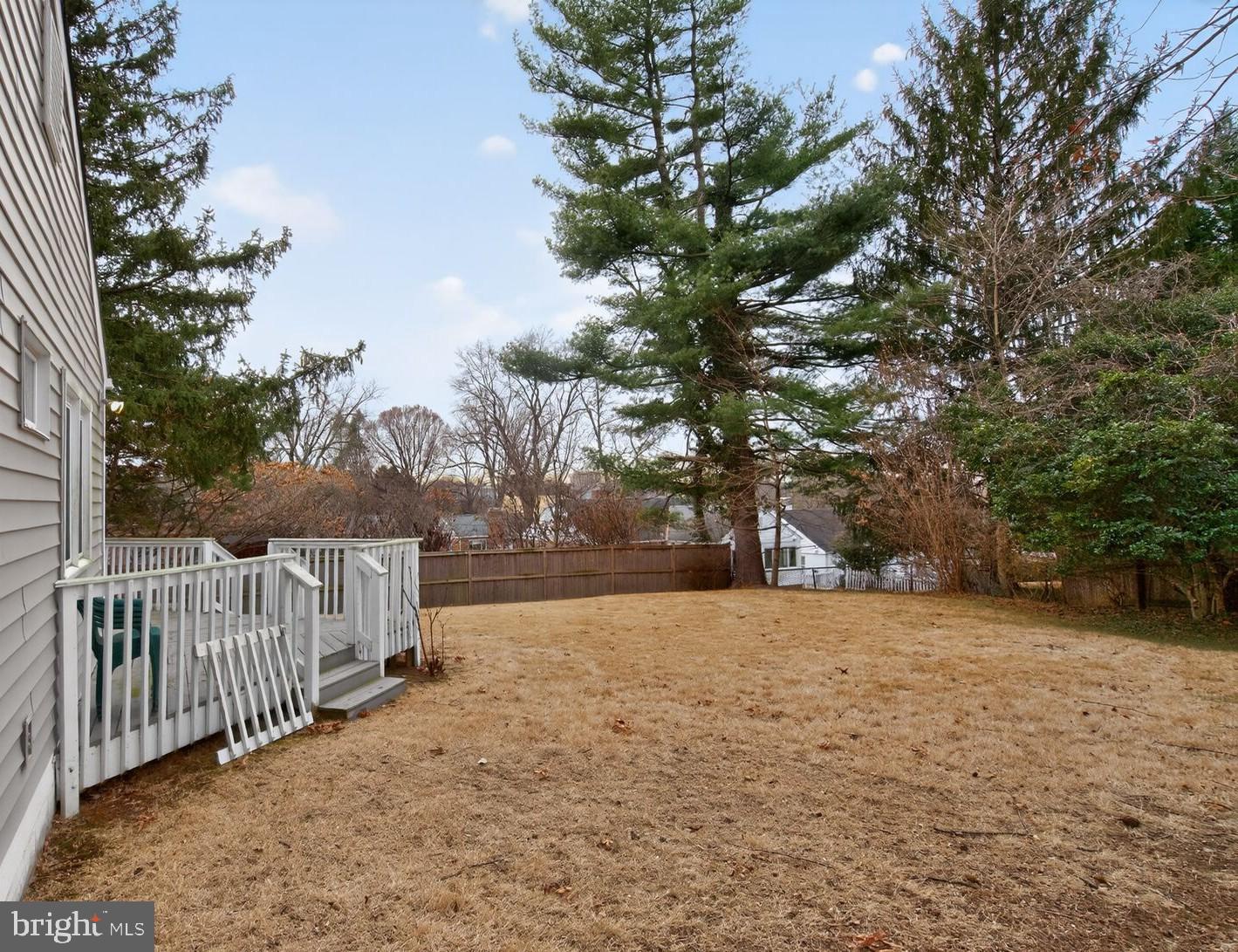 4503 Woodfield Road Kensington, MD 20895 - Photo 27 of 30 Spacious backyard with serene tree line.