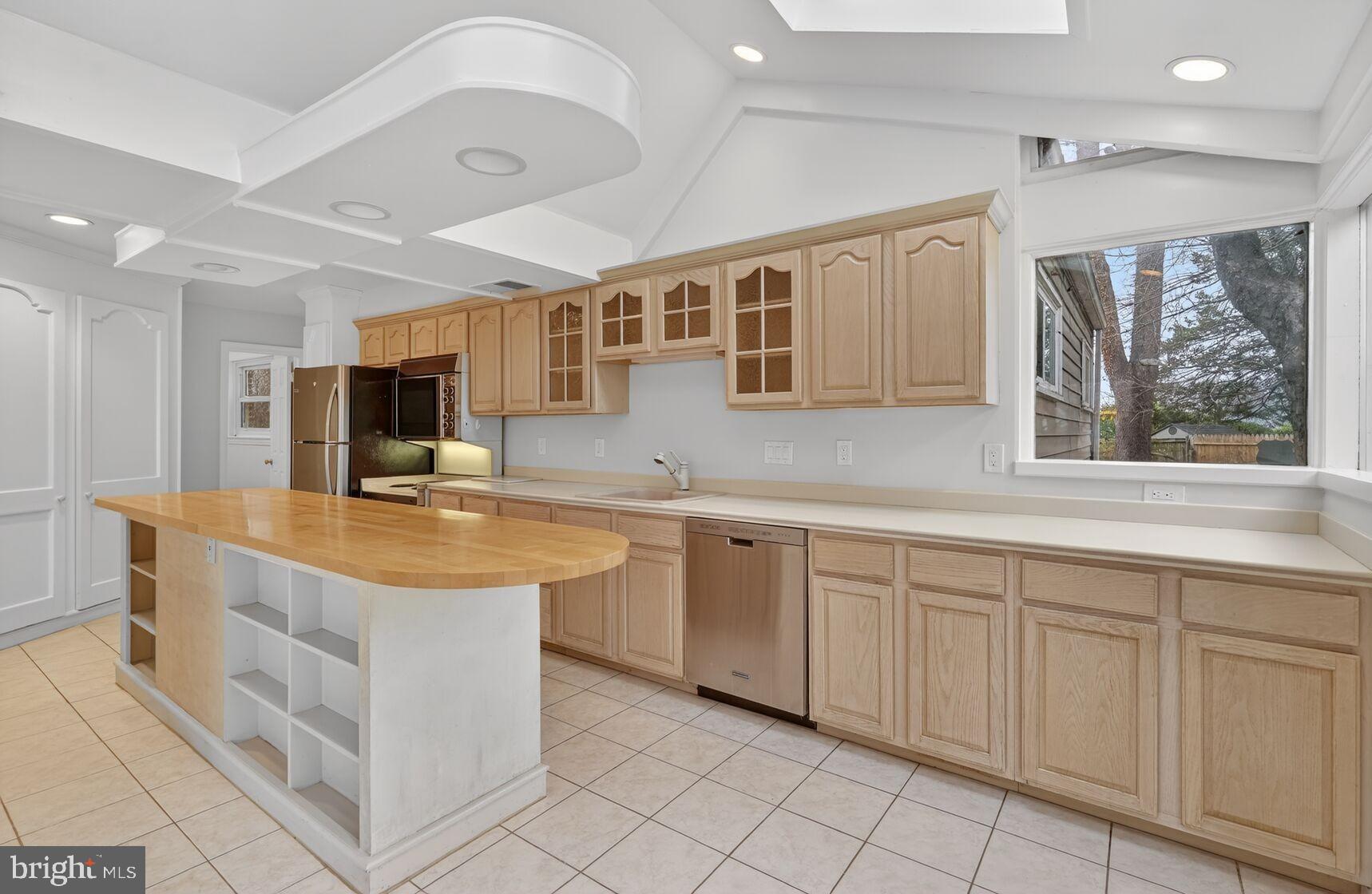 4503 Woodfield Road Kensington, MD 20895 - Photo 6 of 30 Bright and airy kitchen with modern design.