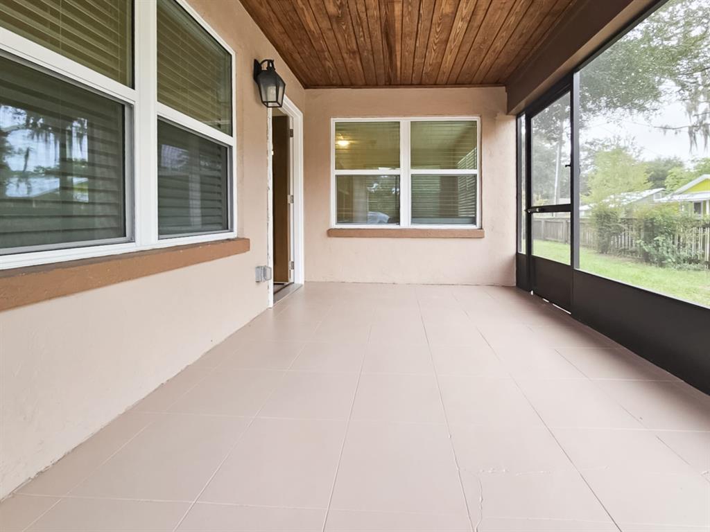 518 Northwest 27th Avenue Gainesville, FL 32609 - Photo 2 of 34 a view of an empty room with a window