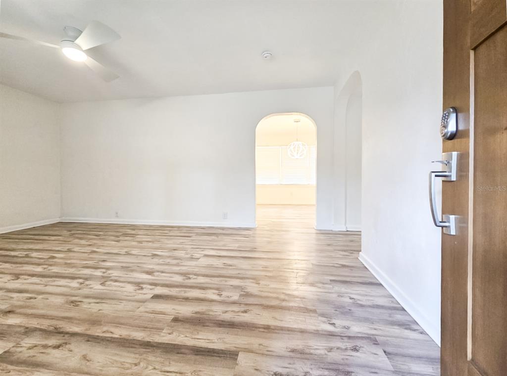 518 Northwest 27th Avenue Gainesville, FL 32609 - Photo 3 of 34 a view of empty room with wooden floor