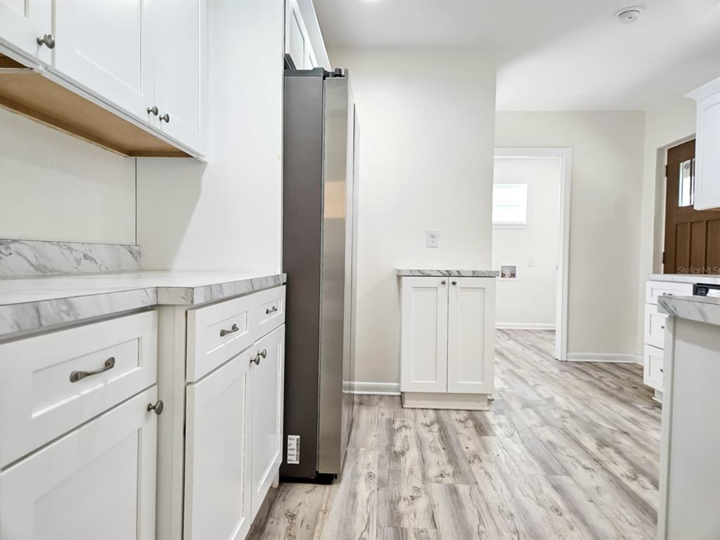 518 Northwest 27th Avenue Gainesville, FL 32609 - Photo 10 of 34 a view of walk in closet with empty racks