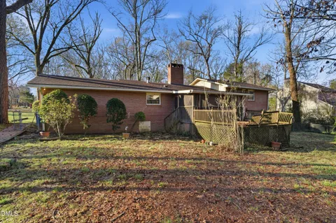 a backyard of a house with lots of green space