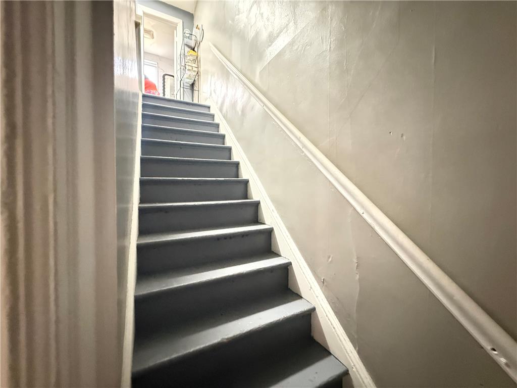 700 Philo Street Scranton, PA 18508 - Photo 11 of 19 Ascend to comfort with these simple, inviting stairs leading to another level.