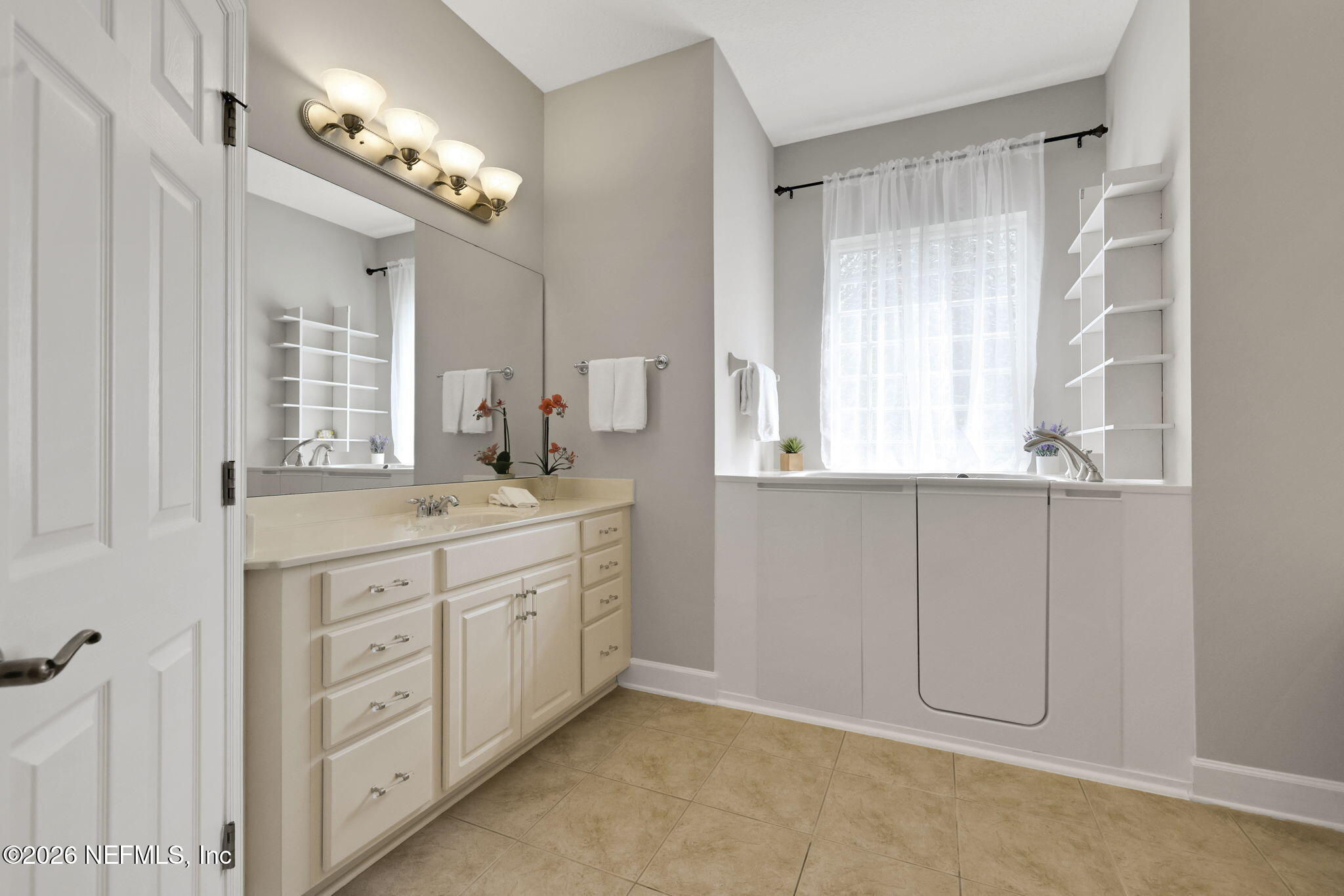 1013 Inverness Drive St. Augustine, FL 32092 - Photo 27 of 65 Two Vanities in Primary Bathroom