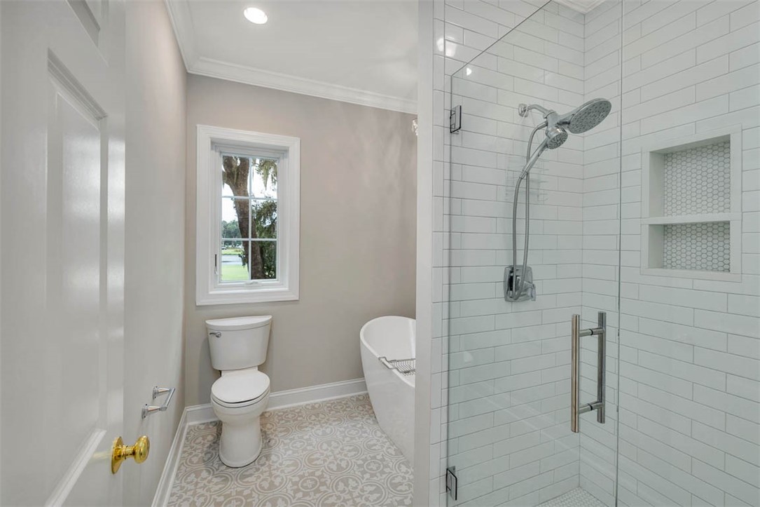 119 Kiln Trail St. Simons Island, GA 31522 - Photo 17 of 24 Primary Bath Tub and separate Tile Shower